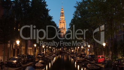 Night view of Amsterdam with canal and Zuiderkerk, Netherlands