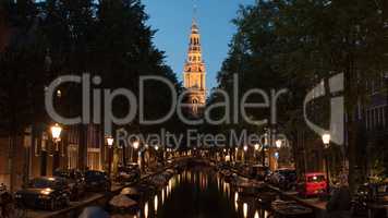 Night view of Amsterdam with canal and Zuiderkerk, Netherlands