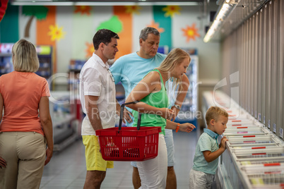 Family doing the shopping in the supermarket