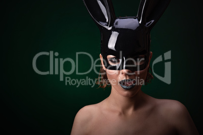 Sexy girl in a black bunny mask