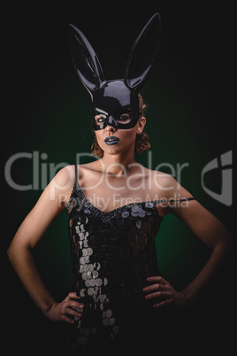 Sexy girl in a black bunny mask