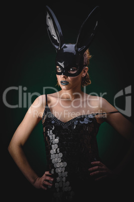 Sexy girl in a black bunny mask