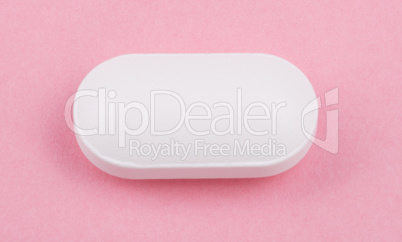 White Pill on Pink Background