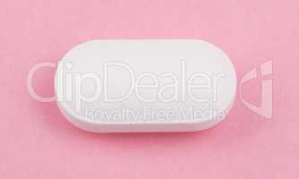 White Pill on Pink Background