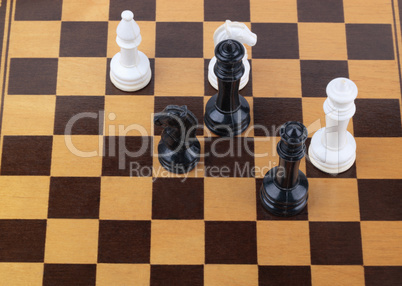 wooden checkerboard with figures