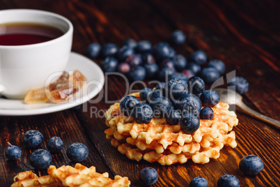 Homemade Waffles with Blueberry and Cup of Tea.