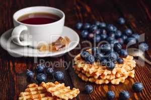 Belgian Waffles with Blueberry and Cup of Tea.