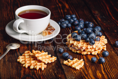 Belgian Waffles with Blueberry and Cup of Tea.