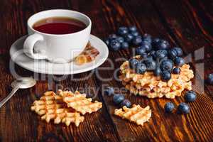 Belgian Waffles with Blueberry and Cup of Tea.