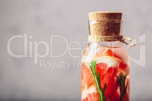 Bottle of Water with Grapefruit and Rosemary.