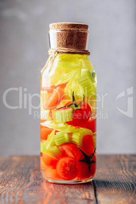 Bottle Water with Tomato and Celery.