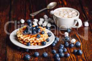 Waffles with Blueberry and Cup of Hot Chocolate.