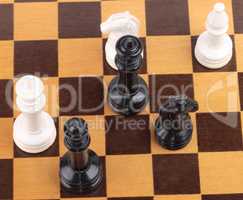 wooden checkerboard with figures