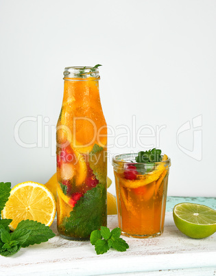 summer refreshing drink lemonade with lemons, cranberry, mint le