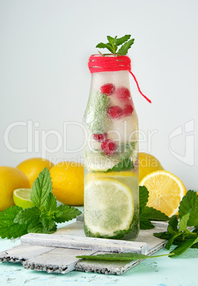 summer refreshing drink lemonade with lemons, mint leaves, lime