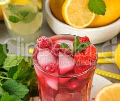 red strawberry lemonade in a glass