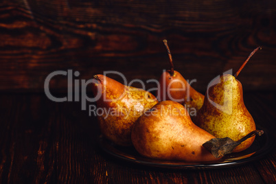 Few Golden Pears on Plate.