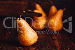 Few Golden Pears on Table.