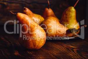 Few Golden Pears on Table.