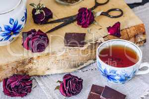 Cup of Black Tea with Chocolate Bars.