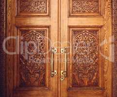 Wooden Door Decorated with Ornament