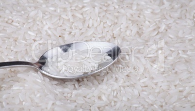 rice food background and teaspoon