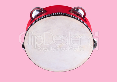 tambourine isolated on pink