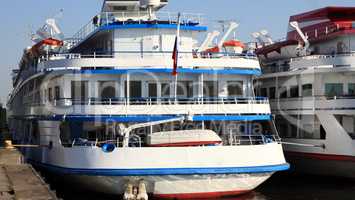 three-dec ship by berth at day to be anchored