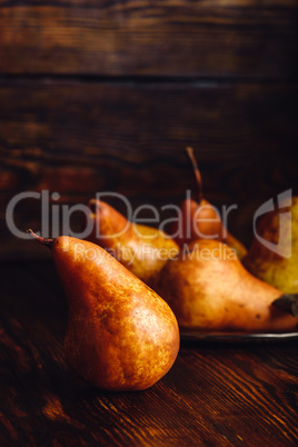 Few Golden Pears on Table.