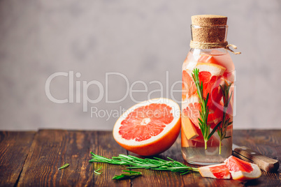 Bottle of Water with Grapefruit and Rosemary.