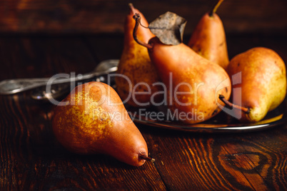 Few Golden Pears on Table.