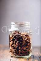 Jar of Star Anise Fruits and Seeds.