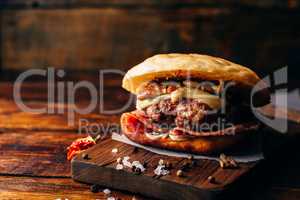 The Casanova Burger on Cutting Board.