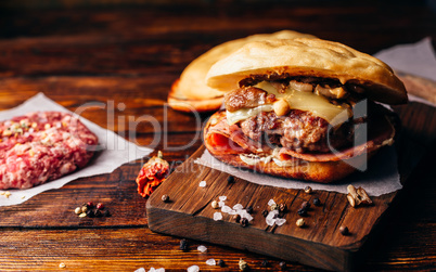 Cheeseburger on Cutting Board.