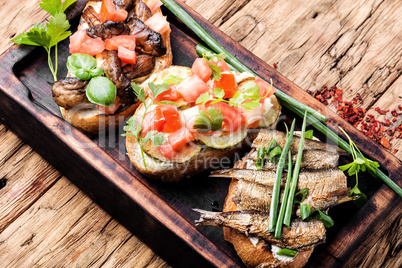 Bruschetta with various toppings.