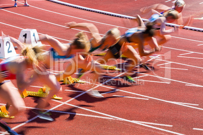 blurred dynamic start of sprint in athletics