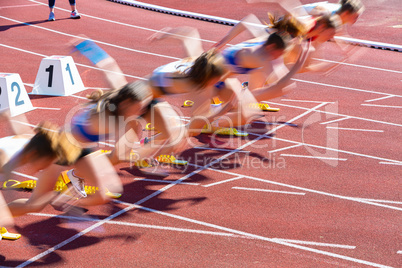 blurred people at the start of sprint