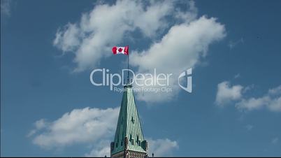 Canadian Parliament on a background of blue sky with white clouds