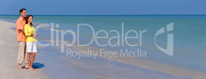 Happy, Man and Woman Couple on An Empty Beach Panorama