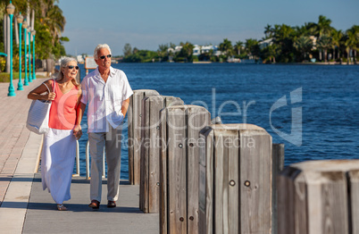 Happy Senior Man Woman Couple Walking Tropical Sea or River