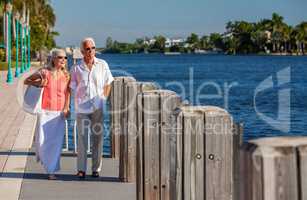 Happy Senior Man Woman Couple Walking Tropical Sea or River