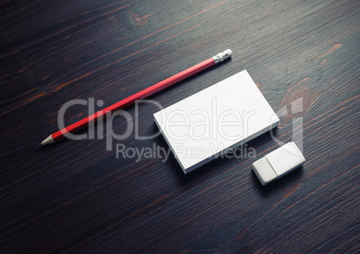 Business cards, pencil, eraser