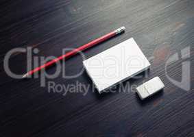 Business cards, pencil, eraser