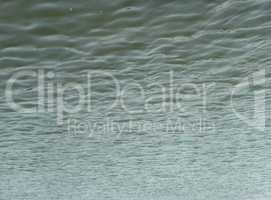 glare on water in city park pond