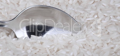 rice background and teaspoon