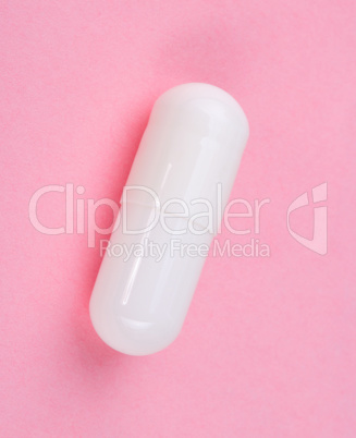 White Pill on Pink Background