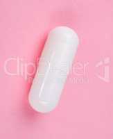 White Pill on Pink Background