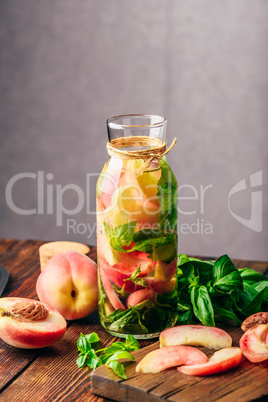 Detox Water with Peach and Basil.