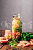 Detox Water with Peach and Basil.