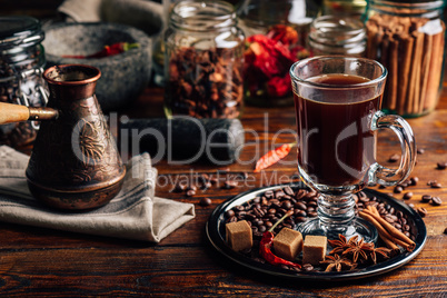 Cezve and Cup of Coffee with Oriental Spices.